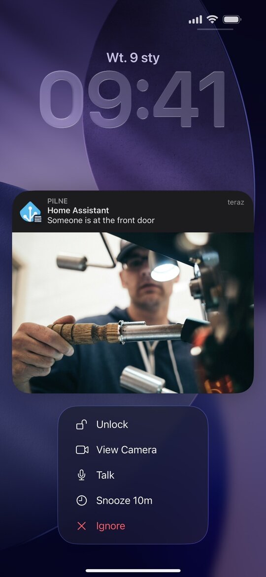 Lock screen notification with image attachment and long-press action menu